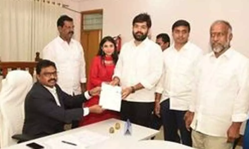 KRJ Bharat of Kuppam submitting his nomination papers to Joint Collector P Raja Babu in Chittoor  on Thursday