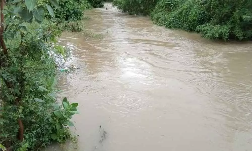 Flood water gushing into Gokarnapuram village (file photo)