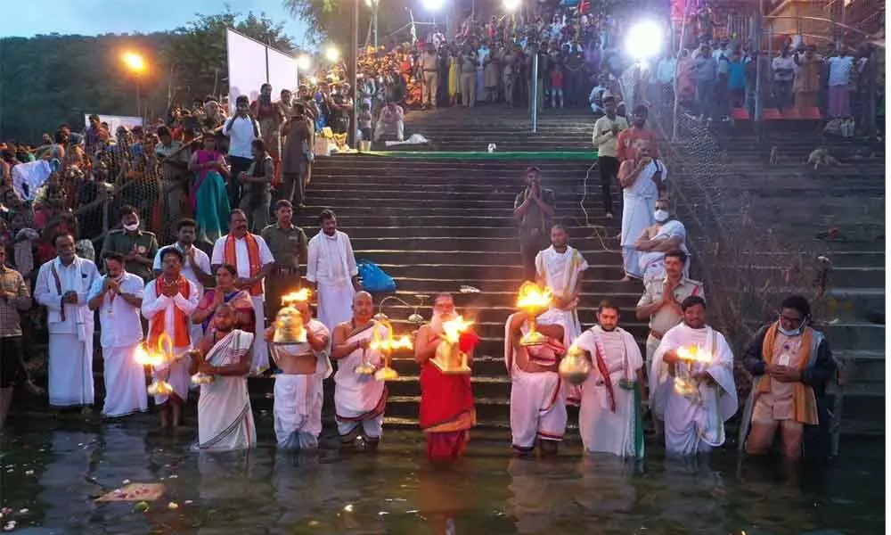 Devotees offering Punya Nadhi Harati to River Krishna Veni at Pathala Ganga in Srisailam on Thursday