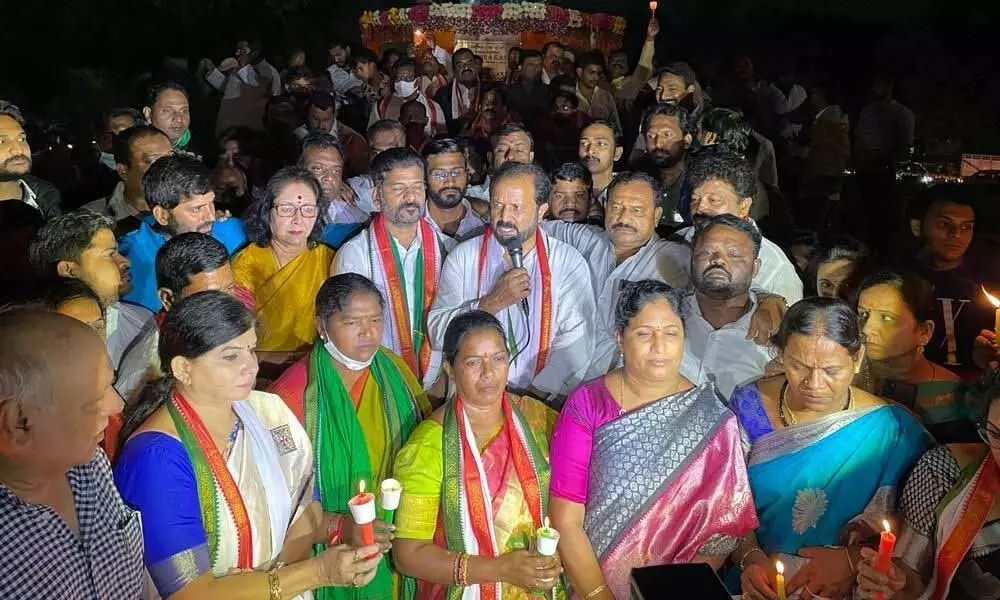 TPCC chief Revanth Reddy and party leaders holding candle light rally at People’s Plaza in Hyderabad on Saturday