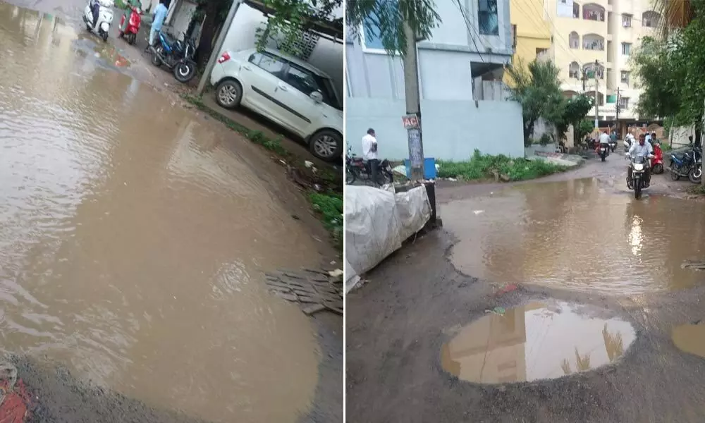 Road leading to Rytu Bazaar at NTR Municipal Corporation in Guntur under the sheet of rain water on Sunday