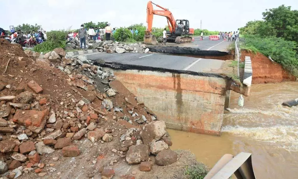 Repair works under progress on highway at Kovur on Sunday