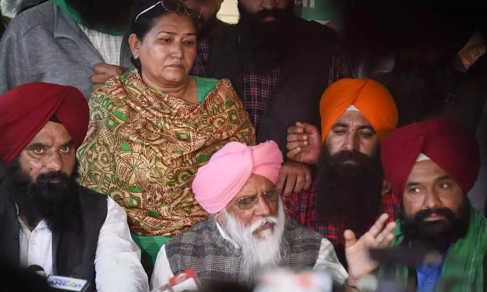 Farmer leader Balbir Singh Rajewal addresses media on the repeal of the three farm laws, at Singhu border in New Delhi on Sunday