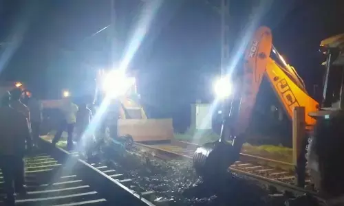 Railway track restoration works being undertaken near Nellore on Sunday