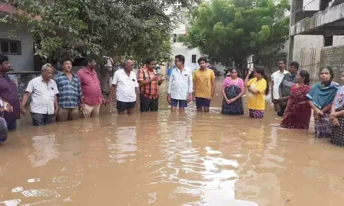 Floodwaters yet to recede in Narayanapuram area in Tirupati on Sunday.