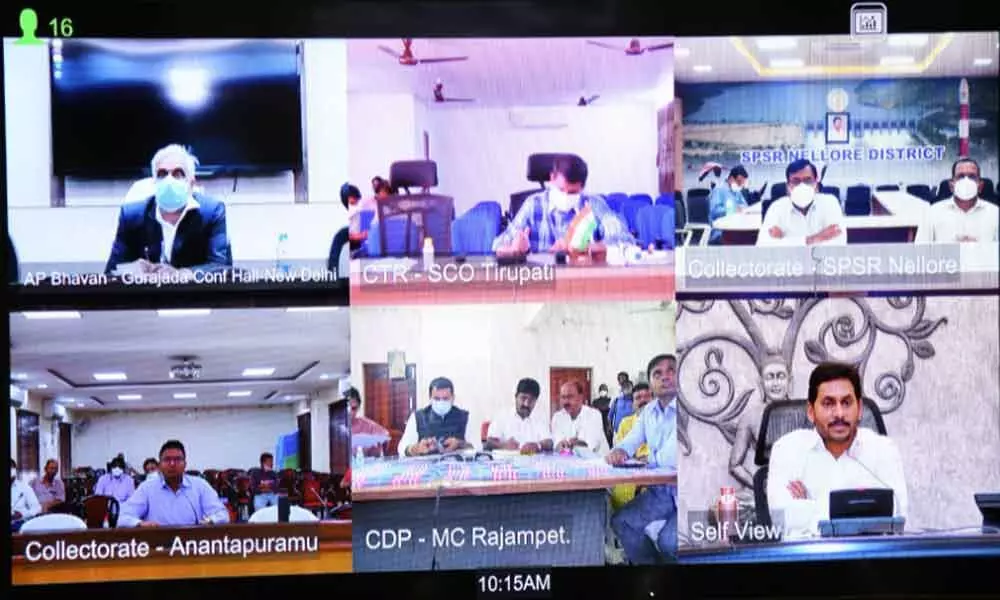 Chief Minister Y S Jagan Mohan Reddy addresses the officials of the flood-affected districts during a video conference on the flood relief measures from the Secretariat in Amaravati on Monday