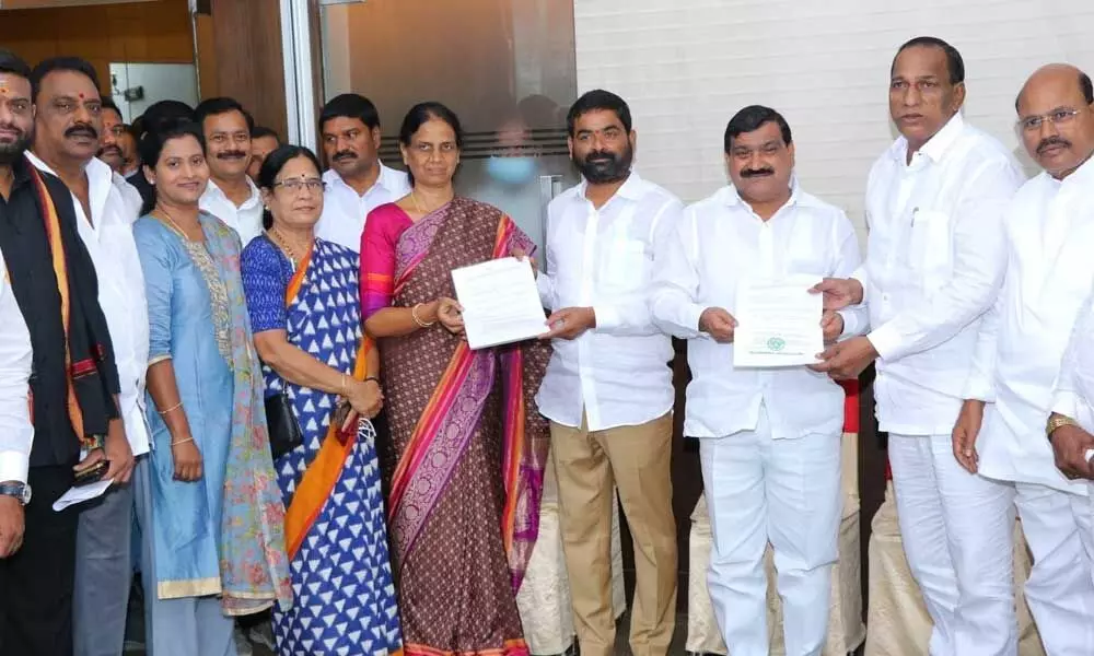 TRS MLC nominees file papers in a low-key affair