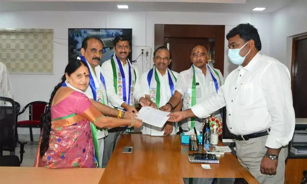 YSRCP MLC candidate under local bodies quota Thumati Madhava Rao submitting nomination at Collectorate in Ongole on Monday