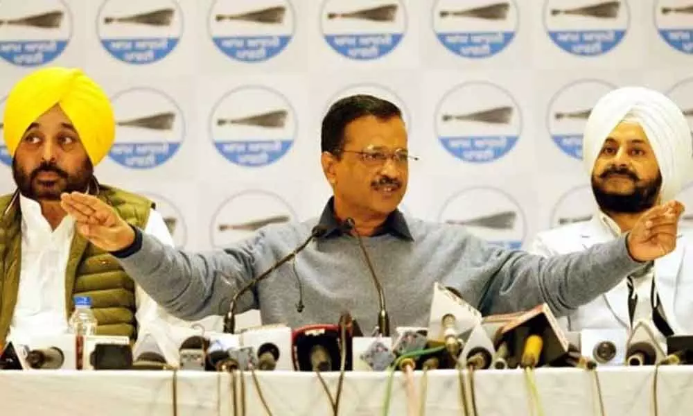 AAP Convener Arvind Kejriwal and AAP state chief Bhagwant Mann address a press conference in Amritsar on Tuesday