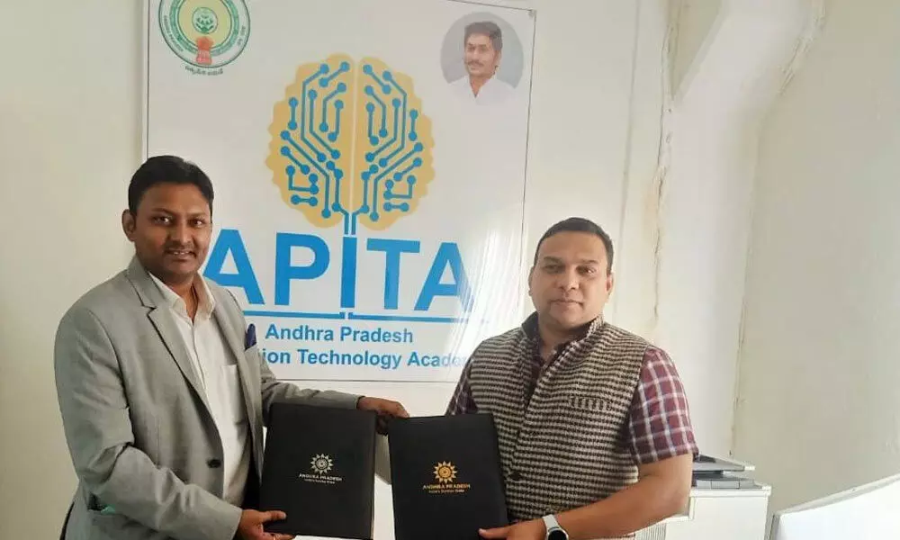 CEO of GTS Tarun Kakani and APITA  CEO of Anil Tentu exchanging MoU in Vijayawada on Tuesday