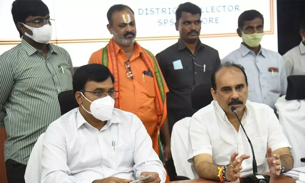 District in-charge Minister B Srinivasa Reddy addressing the media after holding a review meeting with  officials in Nellore on Tuesday
