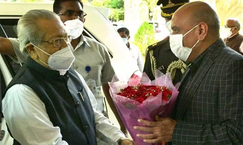 Governor Biswa Bhusan Harichandan being welcomed  by officials on his arrival from Hyderabad, at Raj Bhavan in Vijayawada  on Tuesday