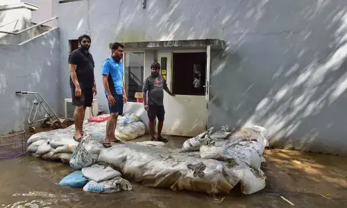 Sandbags being used to stop rainwater from entering Jawaharlal Nehru Centre for Advanced Scientific Research (JNCASR), a multi-disciplinary research institute on Tuesday