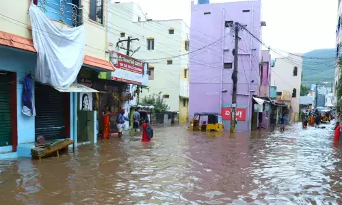 Shops remain closed in the submerged streets of Tirupati on Tuesday
