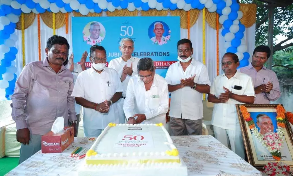 Sudhakar PVC employers cutting a cake on the company’s Golden Jubilee in the factory premises in Suryapet on Wednesday