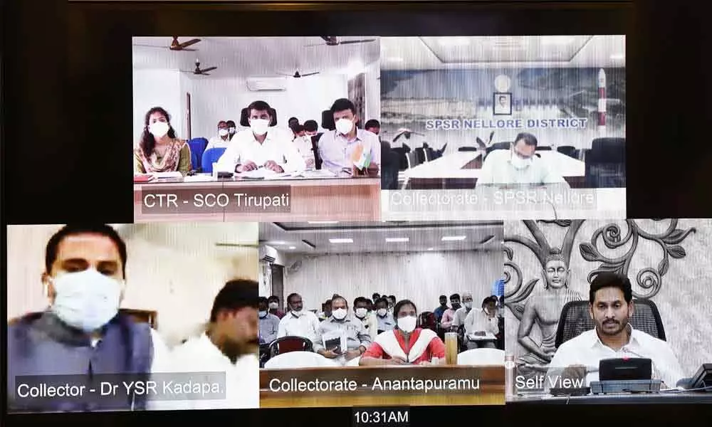 Chief Minister Y S Jagan Mohan Reddy holding a video-conference from the Secretariat at Velagapudi on Wednesday with Collectors and other officials on the relief measures in flood-hit districts