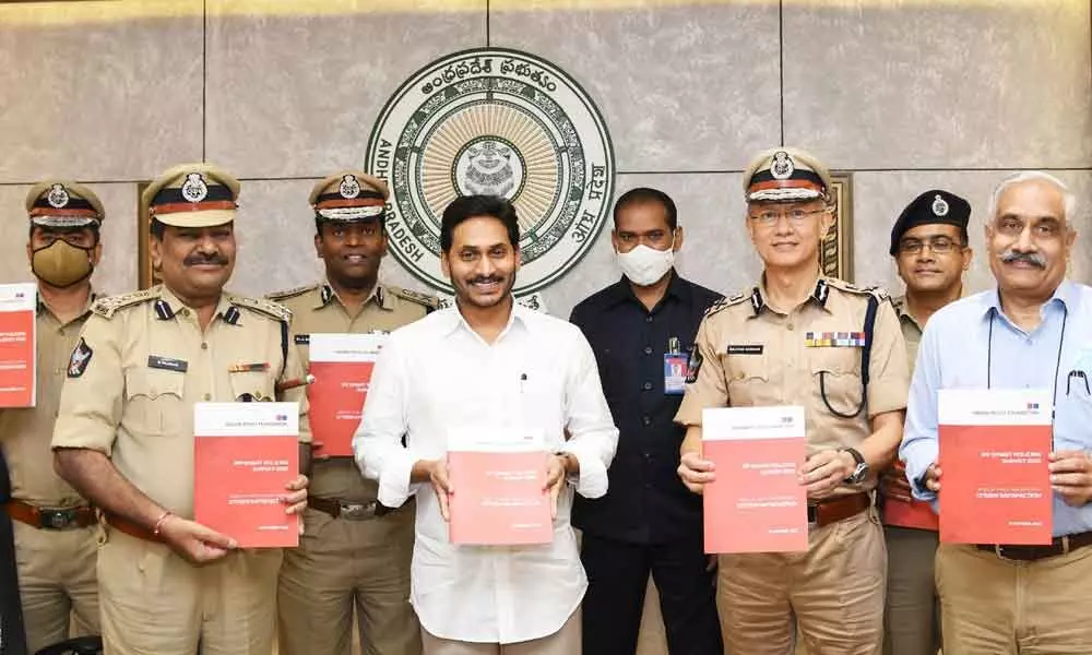 Chief Minister Y S Jagan Mohan Reddy, DGP Gautam Sawang, Chief Secretary Sameer Sharma and other officers holding copies of Smart Survey Report-2021 at the Secretariat at Velagapudi on Wednesday