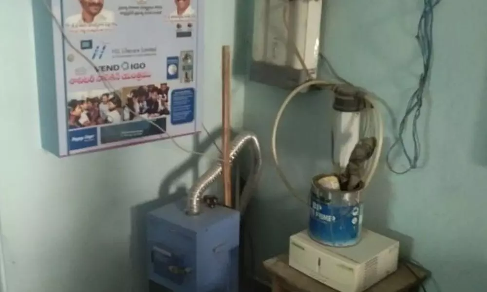 The sanitary napkins vending machine and incinerator left uninstalled at Municipal Primary and High Schools at Ram Nagar in Ongole