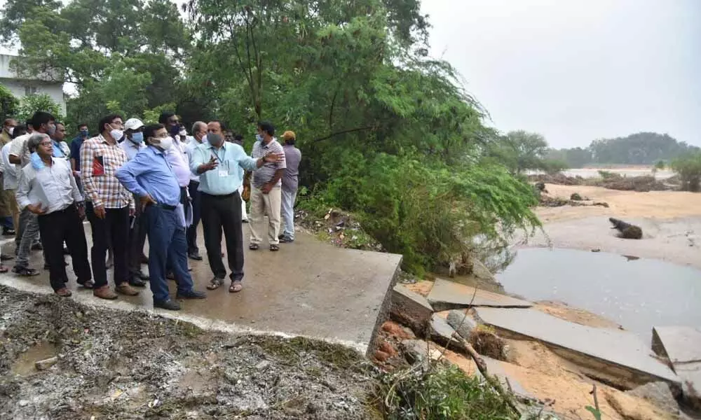 Central team inspecting the washed away Swarnamukhi bridge between Papaniaud Peta and Gudimallam in Renigunta mandal on Saturday