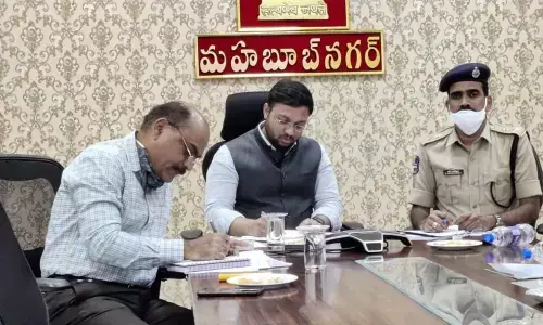 Additional Collector Tejas Nandlal Pawar attending a video conference with chief secretary somesh kumar