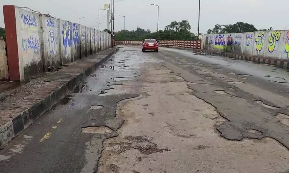 Pothole-filled Jamai Osmania flyover cries for attention