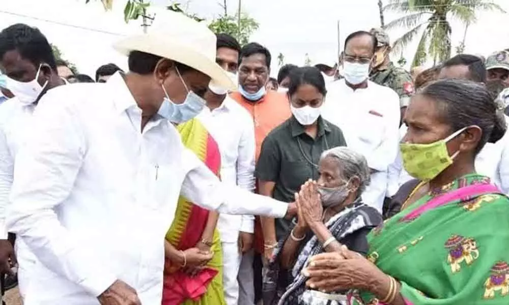 Chief Minister K Chandrashekar Rao interacting with people of his adopted village Vasalamarri in Yadadri-Bhongir district (file photo)