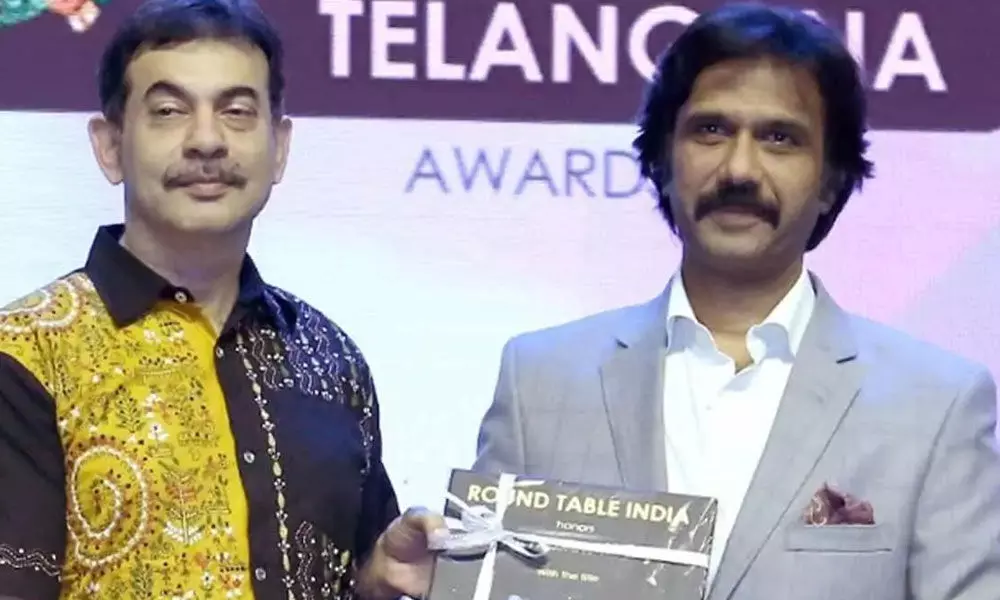 Mohammad Ali Baig receives Pride of Telangana award