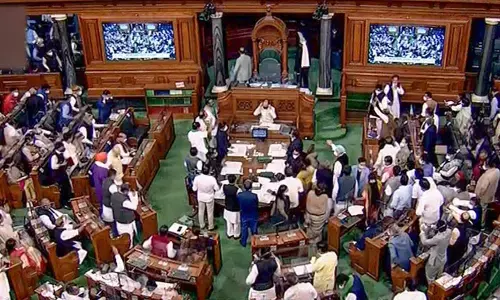 Parliamentarians in Lok Sabha during the Winter Session of Parliament, in New Delhi on Monday