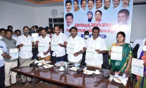 MLC Lella Appi Reddy addressing a meeting held at GMC office in Guntur city on Wednesday