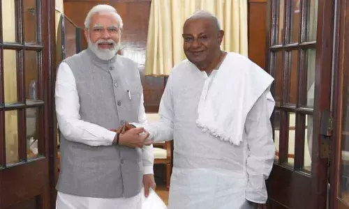 Narendra Modi and H D Deve Gowda