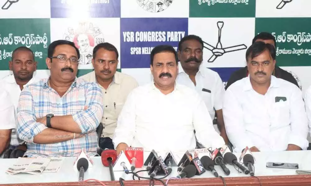 Sarvepalli legislator Kakani Govardhan Reddy interacting with the media at the party office in Nellore on Thursday