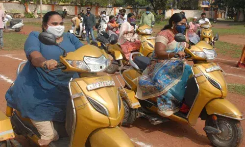 Differently-abled women competing in a race in the sports and games in Ongole on Thursday