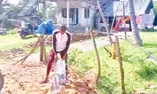 Sod Sai Vinay working as a labourer to support his family