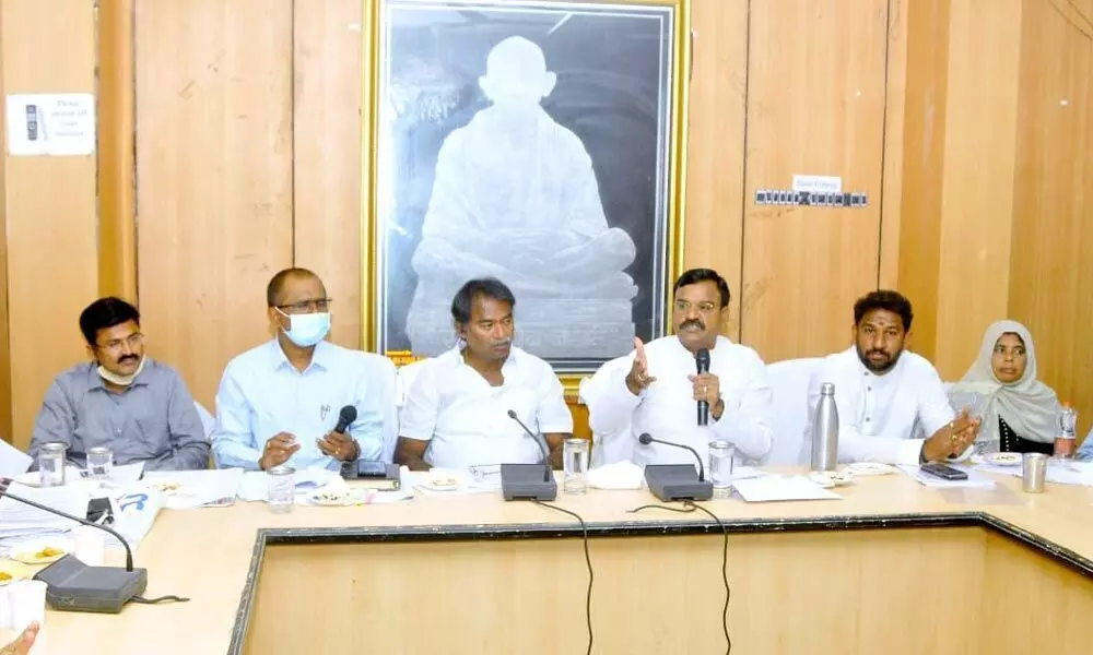 Deputy Chief Minister Amzath Basha speaking at the awareness camp on OTS in Kadapa on Saturday