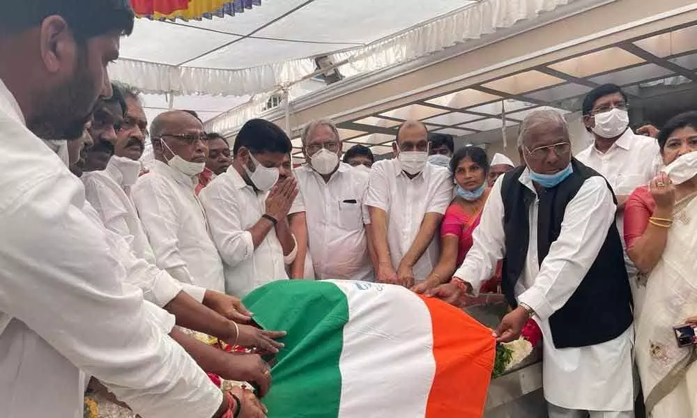 TPCC president A Revanth Reddy paying tributes to former CM K Rosaiah at his residence at Ameerpet in Hyderabad on Saturday