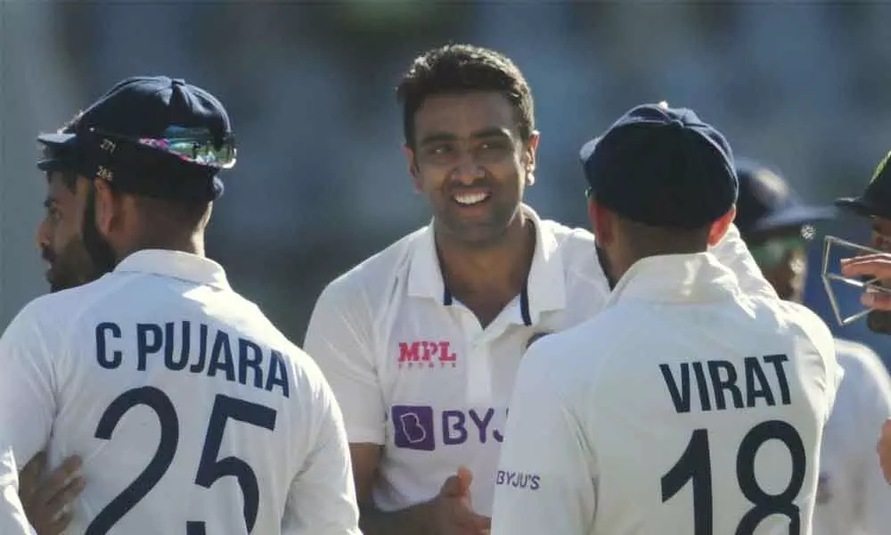 Indians R Ashwin celebrates with teammates the wicket of New Zealand’s Ross Taylor on the 3rd day of the 2nd Test at Wankhede Stadium, in Mumbai on Sunday