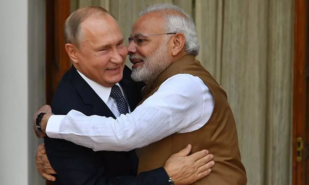 Vladimir Putin and Narendra Modi