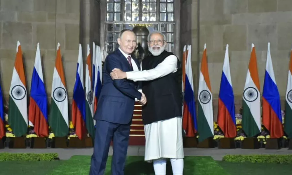 Prime Minister Narendra Modi receives Russian President Vladimir Putin for a meeting at Hyderabad House in New Delhi on Monday