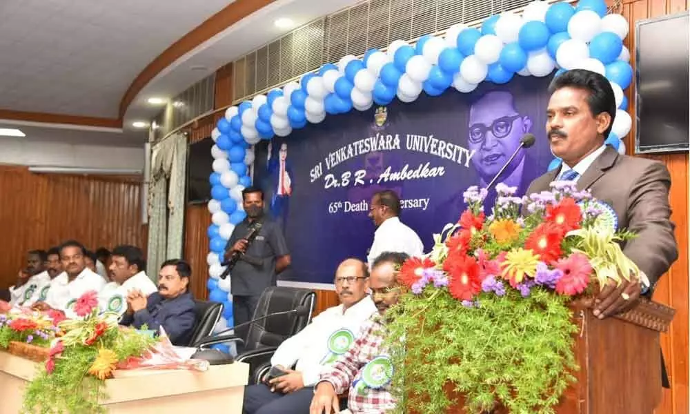 State SC Commission member Challam Anand Prakash speaking at Dr B R Ambedkar death anniversary programme in Tirupati on Monday. Koduru MLA K Srinivasulu, SVU Vice-Chancellor Prof K Raja Reddy, Rector Prof V Srikanth Reddy and others are on dais.