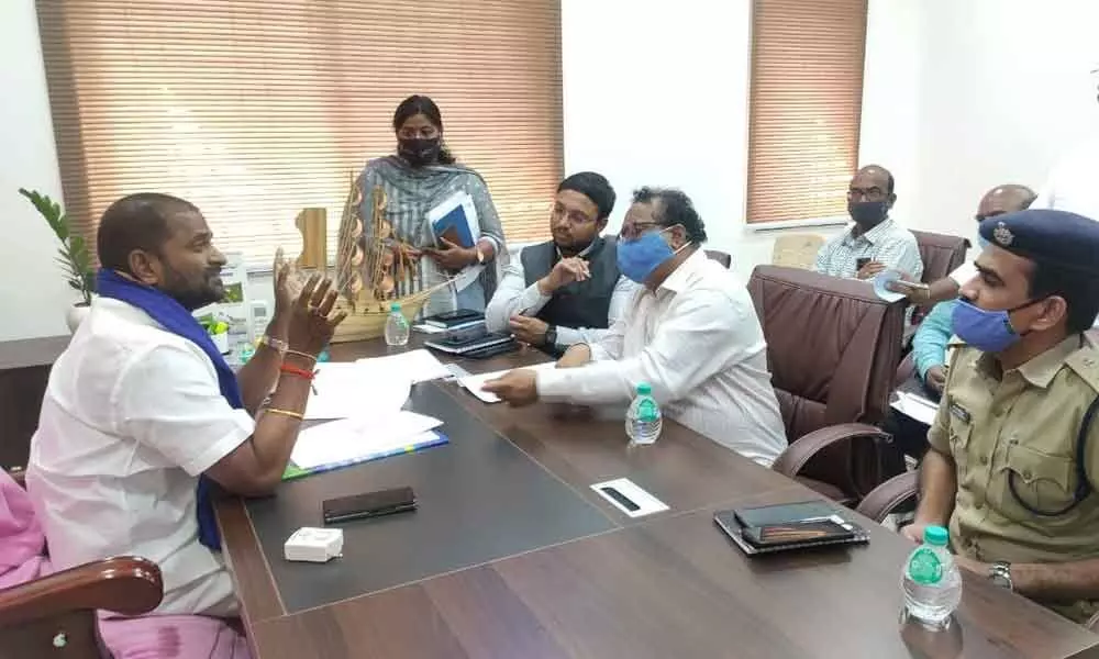 Minister for Sports, Youth Welfare and Excise Dr V Srinivas Goud speaking to the officials directing them to draw a comprehensive development action plan for Mahabubnagar district