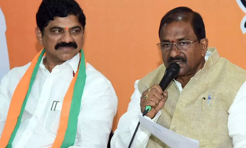 BJP state president  Somu Veerraju (right) addressing a press conference at party office in Vijayawada on Tuesday (Hans photo: Ch Venkata Mastan)