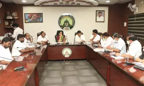 Mayor Dr R Sirisha and Municipal Commissioner PS Girisha holding a meeting with engineering officials on revamping of drains to prevent inundation during heavy rains in Tirupati on Tuesday
