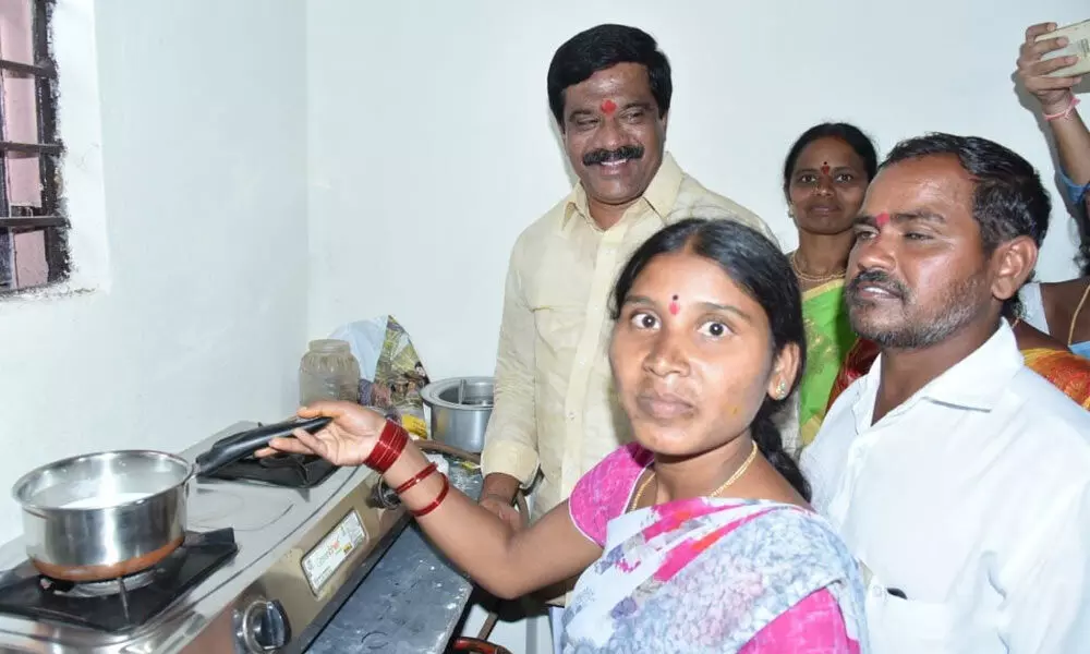 Minister Prashant Reddy takes part in new house warming ceremony in Velpur on Wednesday