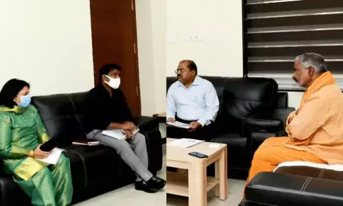 Minister Peddireddi Ramachandra Reddy reviewing the programmes with Md Imtiaz of SERP, Panchayat Raj and Rural Development special commissioner Shantipriya Pandey, Swatchandra Corporation CEO Dr Sampat Kumar and others in Vijayawada on Wednesday