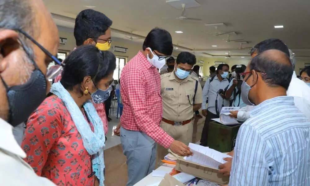 District Collector VP Gautham  and Police commissioner Vishnu Warrier inspecting arrangements for MLC polls at Khammam on Thursday.