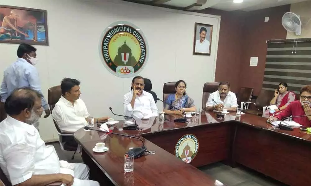 MLA Bhumana Karunakar Reddy, Mayor Sr R Sirisha and Municipal Commissioner  P S Girisha discussing arrangements for conducting national-level Kabaddi tournament at a meeting in Municipal Office in Tirupati on Thursday.