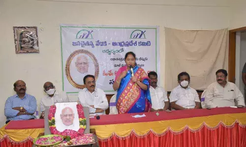 Home Minister Mekathoti Sucharita, MLA Maddali Giridhara Rao, MLCs Dokka Manikya Vara Prasad and KS Lakshmana Rao paying tributes to the portrait of late Chief Minister K Rosaiah at a programme held at Madyapana Vimochana Prachara Committee office at Ramannapet in Guntur city on Thursday