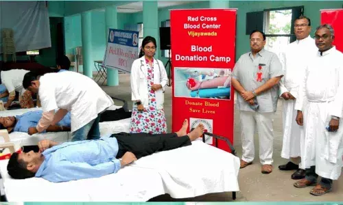 Students donating blood at the blood donation camp conducted at Andhra Loyola College in Vijayawada on Thursday