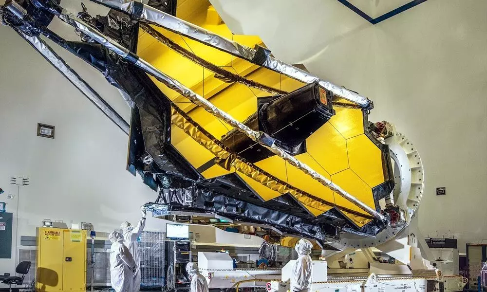 The 6.5-metre-wide primary mirror of the James Webb Space Telescope is folded up for launch. Credit: NASA/Chris Gunn
