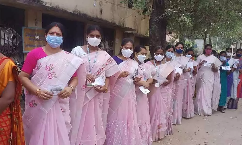 Women leaders came to a polling station with a dress code to cast their vote in the MLC election in Karimnagar on Friday
